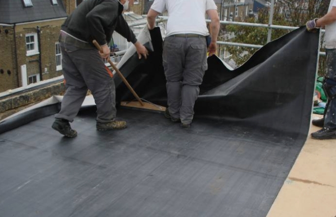 EPDM rubber roofing membrane installed on flat commercial roof Ocean County NJ